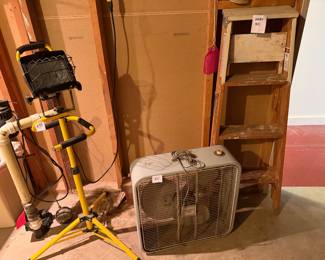 Spot light, vintage fan, wooden ladder