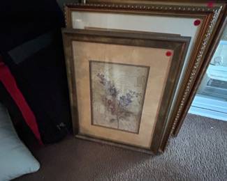 Various prints/paintings at varying price points and quality, also found hung throughout the home