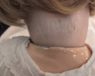 A..M. K bisque head doll second image