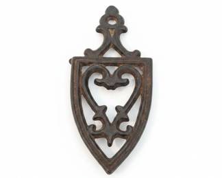 Vintage Cast Iron Trivet with Heart and Shield Design