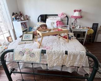 Antique bed, comforter, book shelf