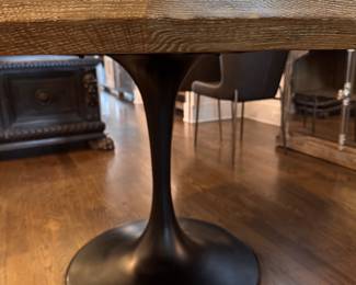 Arhaus Pedestal Dining Table with Wood Top. Measures 55" D x 30" H with 28" Clearance. Photo 5 of 8.
