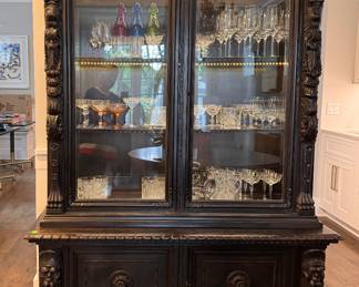 Antique Renaissance Revival Walnut Cabinet with Beveled Glass Doors and Claw Feet. Circa 1900. Measures 55" W x 21" D x 78" H. Photo 1 of 7.