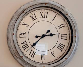 Battery Operated Wall Clock. Measures 24" D.