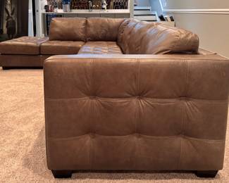 Arhaus Tufted Leather Upholstered Sectional Sofa with Left Facing Chaise Sofa. Measures 90" W x 40" D x 121" L. Photo 2 of 6.