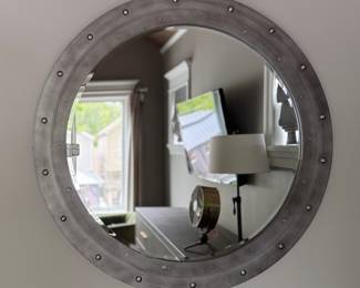 Arhaus Round Metal Mirror. Measures 36" D. Photo 1 of 2.