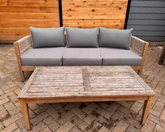 Teak Coffee Table. Measures 48" W x 24" D x 16" H.