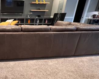 Arhaus Tufted Leather Upholstered Sectional Sofa with Left Facing Chaise Sofa. Measures 90" W x 40" D x 121" L. Photo 3 of 6.