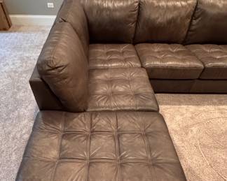 Arhaus Tufted Leather Upholstered Sectional Sofa with Left Facing Chaise Sofa. Measures 90" W x 40" D x 121" L. Photo 4 of 6.