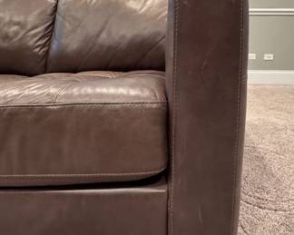 Arhaus Tufted Leather Upholstered Sectional Sofa with Left Facing Chaise Sofa. Measures 90" W x 40" D x 121" L. Photo 6 of 6.