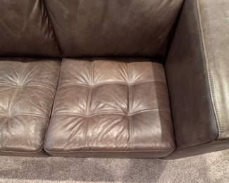 Arhaus Tufted Leather Upholstered Sectional Sofa with Left Facing Chaise Sofa. Measures 90" W x 40" D x 121" L. Photo 5 of 6.