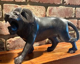 Heavy hand carved lion
