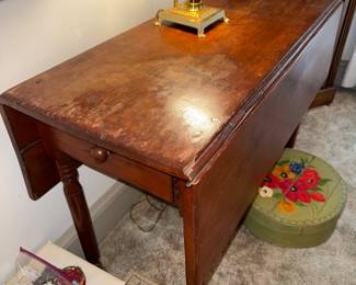 Primitive drop leaf table
