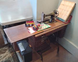antique treadly sewing machine. Finish as is
