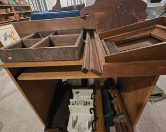 tons of wooden art and frames