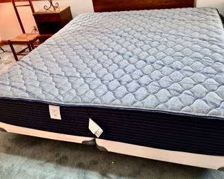 Excellent King size Serta mattress, box spring and frame, headboard not included.