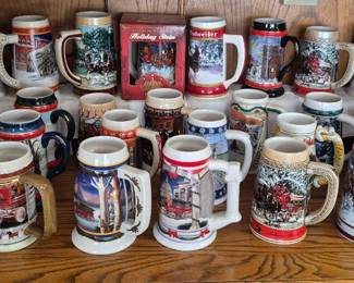 Large collection of Budweiser Holiday Christmas Steins 