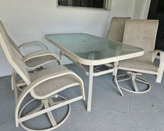 4  Swivel chairs with table
