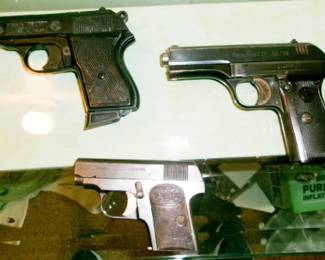 HAND GUNS