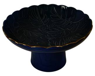 294 - Tabitha Brown Footed Pedestal Bowl (Description): Vibrant Blue Finish w/ a monstera leaf embossed design and gold-tone edging 6 x 10