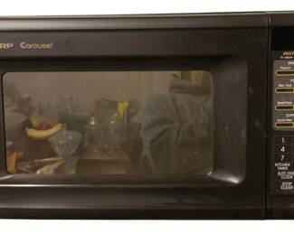 418 - Sharp Carousel Microwave - 20 x 15 x 11 (Description): Used as is electric/electronic/mechanical item. No guarantee all components, untested.