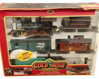 716 - Gold Rush Train Set in Box (Description): Used as is electric/electronic/mechanical item. No guarantee all components, untested.