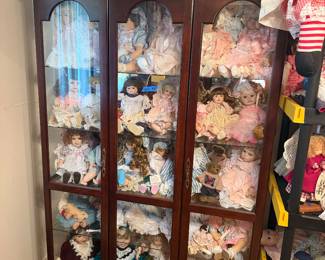 Gorgeous glass cabinet and porcelain dolls