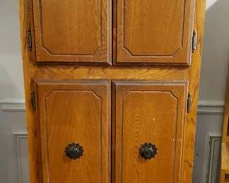 Tall Oak Finish Storage Cabinet