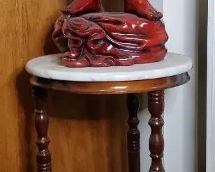 Red Buddha Statue and MarbleTop Accent Table