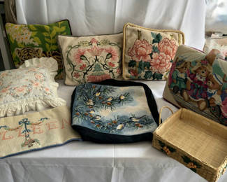 Lot 149: Needlepoint cushions, a woven basket, and a tapestry-top stool