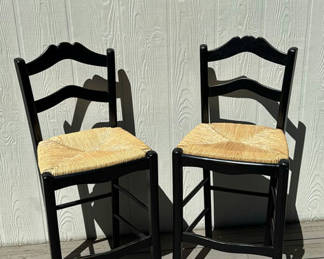 Lot 99: Two Shaker Counter stools with thatched seats.