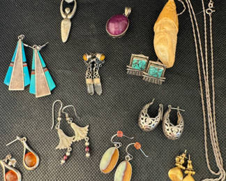 Lot 175: A Curated Collection of Sterling Silver Jewelry