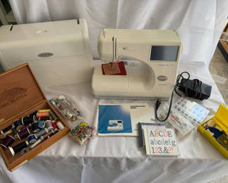Lot 156: Memory Craft sewing machines with accessories