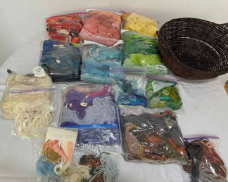 Lot 140: Assorted Yarn Skeins, Needlepoint Book, and Basket