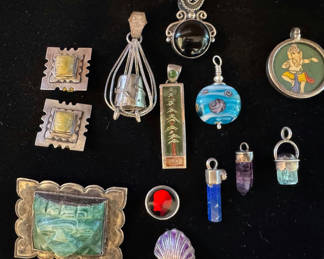 Lot 176: Assorted jewelry collection with pendants and beads