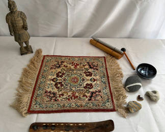 Lot 154: Terracotta Warrior statue, decorative fringe rug, and pottery/stone collection