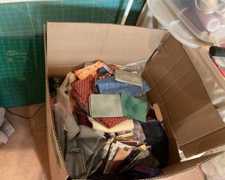 Box filled with fabrics