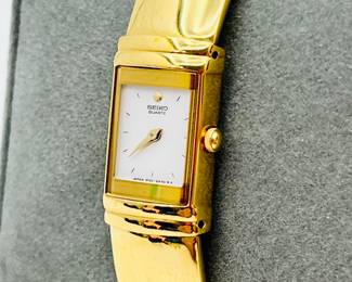  Ladies Seiko Gold-Tone Rectangular Quartz Bangle Watch Model 1F20-5K19