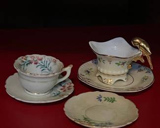 Victorian Style Porcelain Tea Cup, Saucer, and Creamer Set with Gilt Parrot