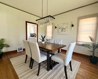 Dining table for 6, floor rug, table top and floor faux plants, wall art