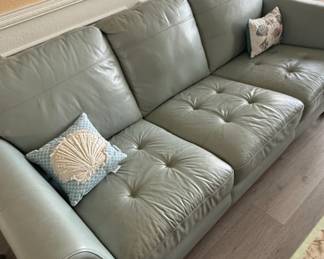 Light Gray Leather Sofa with Tufted Cushions