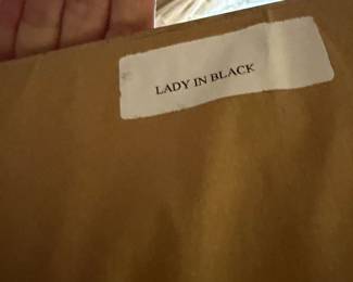 #5 - $68 - Lady in black framed art 27wx29t