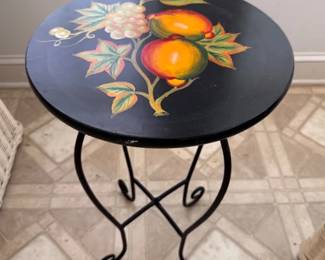 Hand painted side table with wrought iron base