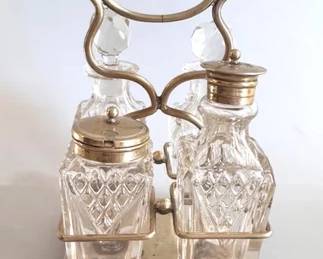 Vintage four piece cruet set in holder