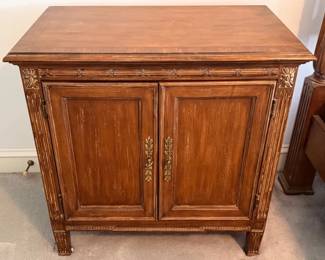 Wood two door nightstand with carved details