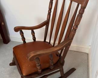 Rocking chair with padded leather seat