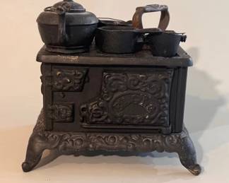 Antique salesman sample cast iron stove and accessories