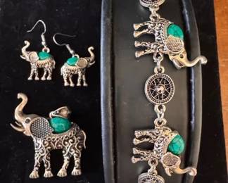 Faux turquoise and silver toned elephant bracelet, pendant and earrings set