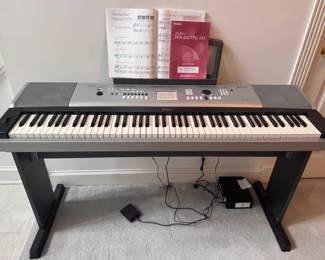 Yamaha portable grand electronic keyboard