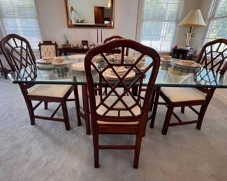 Chinese Chippendale glass top dining table and four chairs